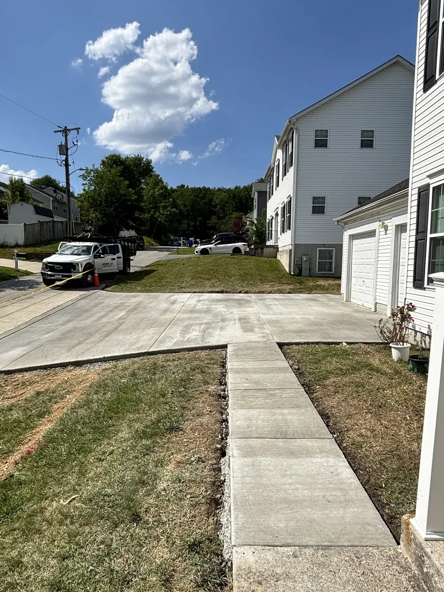 Concrete sidewalk installation by Actaeon in Maryland